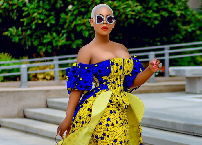 Liberian Beauty, Sarlea Mah In A Fabulous  African Dress With D&G Sun Glasses On