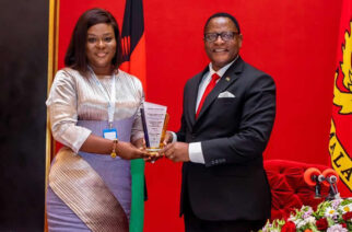 H.E Louisa Atta-Agyemang (left) presenting the award to President Dr Lazarus McCathy Chakwera